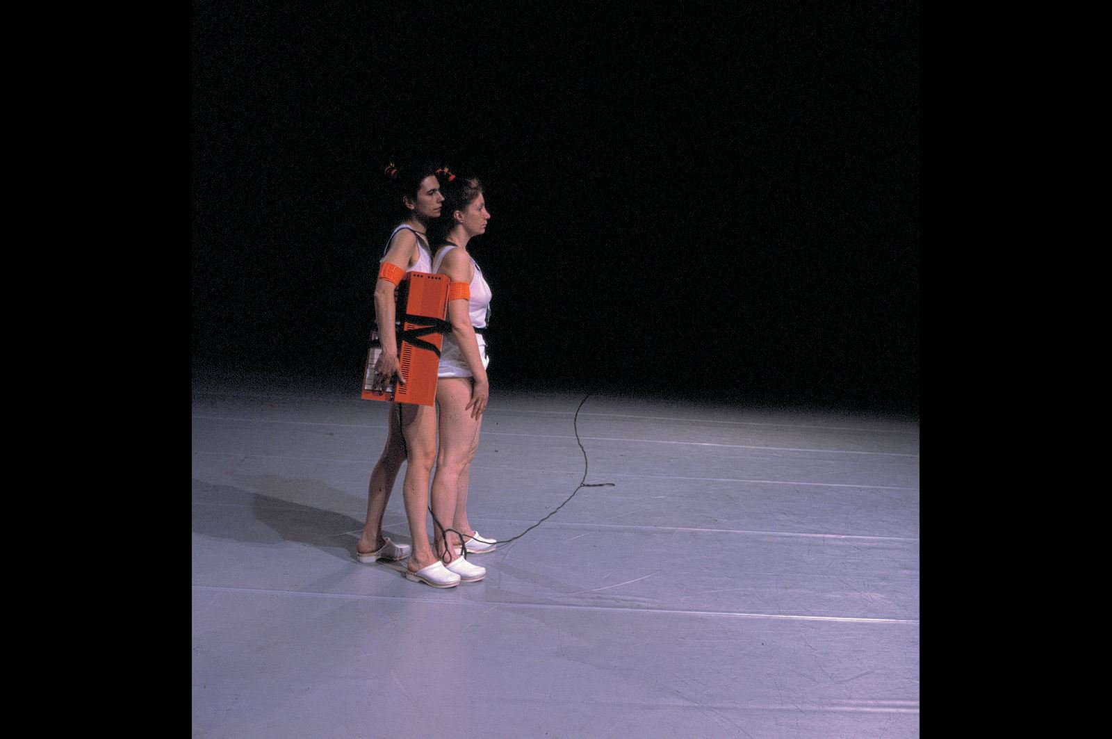 Performance view, Liliana Moro, Studio per un probabile equilibrio in movimento (Study for a likely balance in motion), with Giovanna Lué, realised during the theatre performance Canti marini 1 e 2 by Virgilio Sieni, 1997