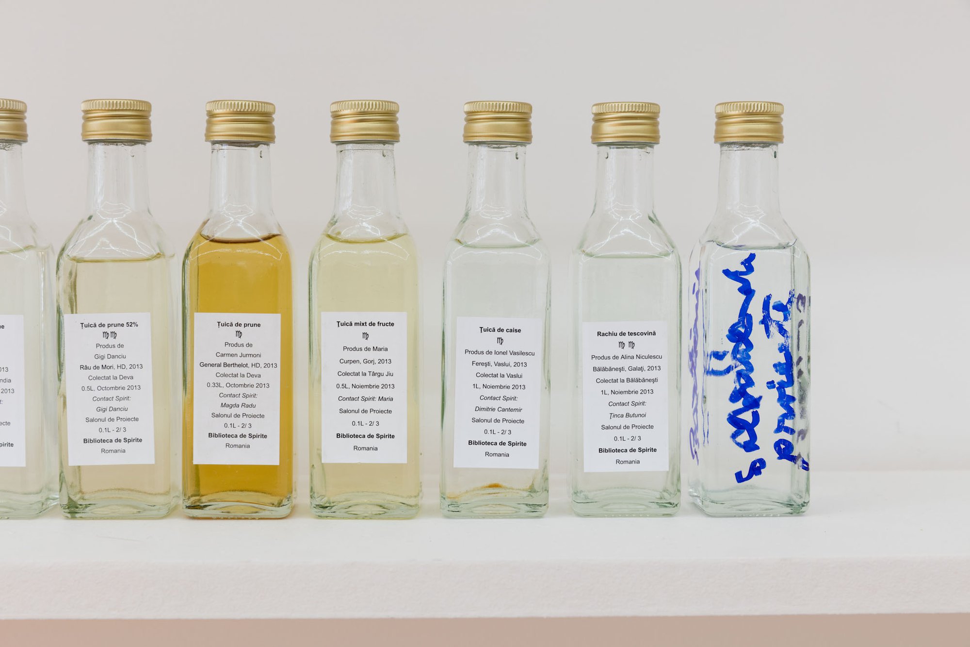 Banu Cennetoğlu, Library of Spirits I: BANUBARMIXT, detail, an assortment of 111 home-made, non-commercial spirits produced and collected in Romania, packaged in 100ml glass bottles, 2013