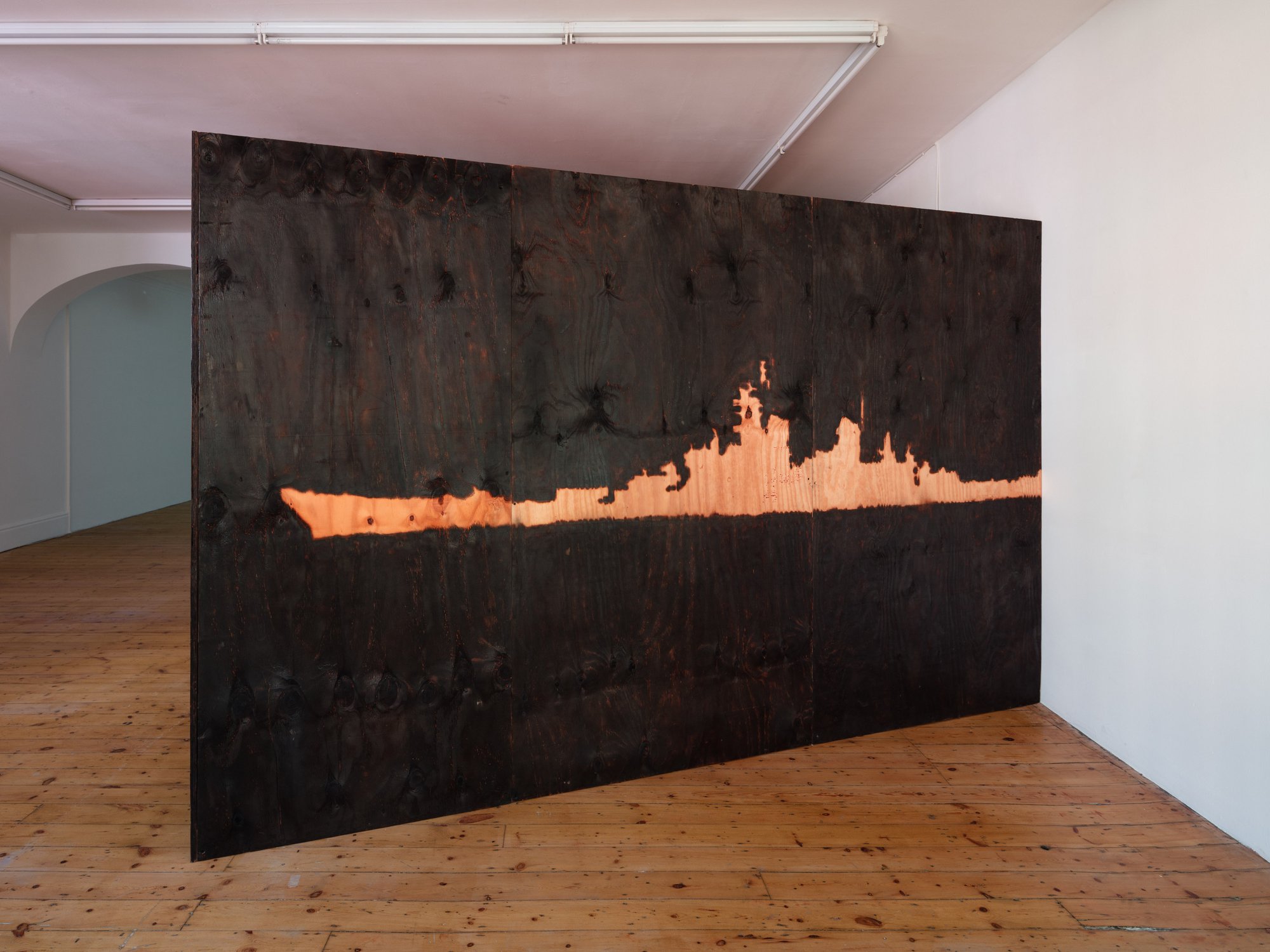 Mark Aerial Waller, Midwatch, infrared video and installation: burnished wooden box with pyrograpic drawing of warship, 29” CRT Monitor, caterers table and military chairs, 1999 – 2001