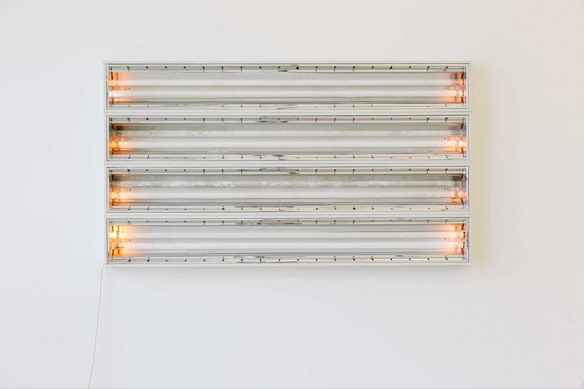 Iris Touliatou, Untitled (Still not over you), ceiling light fixtures, aluminium frame, fluorescents, wires, cable, 153 x 21 x 9 cm each (60 1/4 x 8 1/4 x 3 1/2 in each), 2021. Installation view, Anti-Structure, DESTE Foundation, Athens, 2021