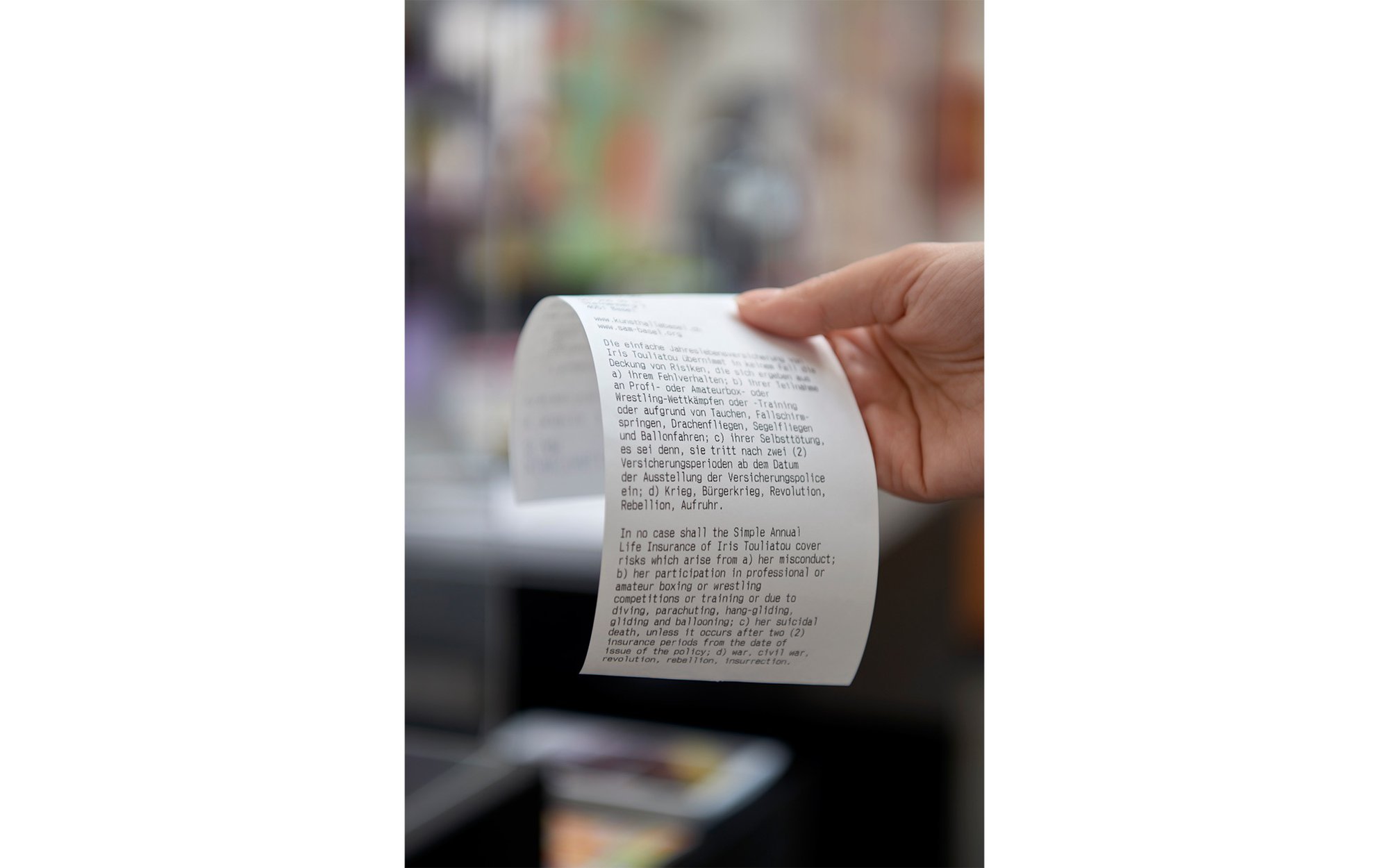 Iris Touliatou, SCORE FOR COVERAGE (EXCEPTIONS – EXCLUSIONS), print on receipt, dimensions variable, 2023.Installation view, Iris Touliatou, GIFT, Kunsthalle Basel, Basel, 2023.