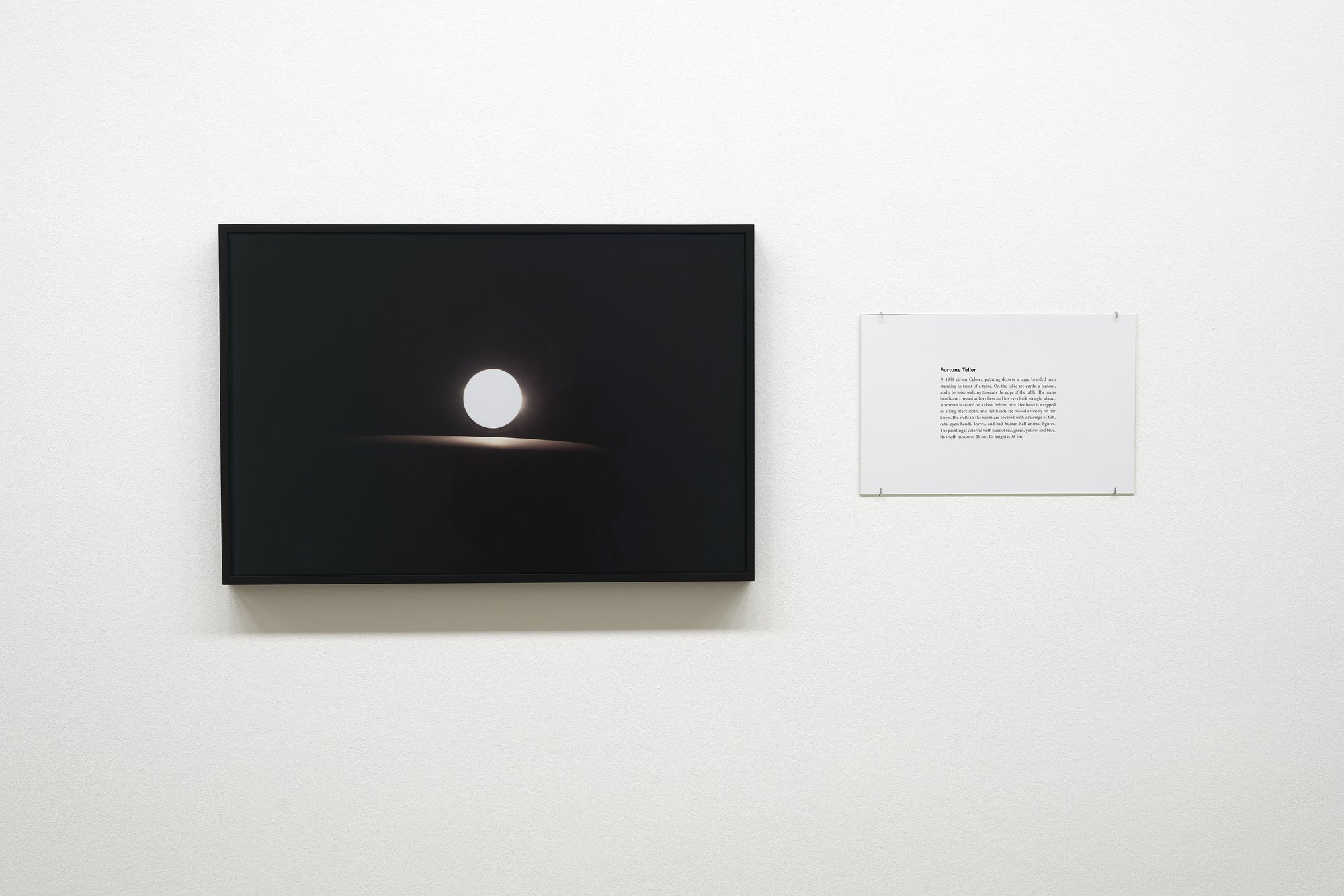 Iman Issa, Fortune Teller (study for 2013), C-print, framed, text panel under glass, 54.3 x 80.7 cm, 2013. Installation view, Proxies, with a Life of Their Own, Taxispalais Kunsthalle Tirol, Innsbruck