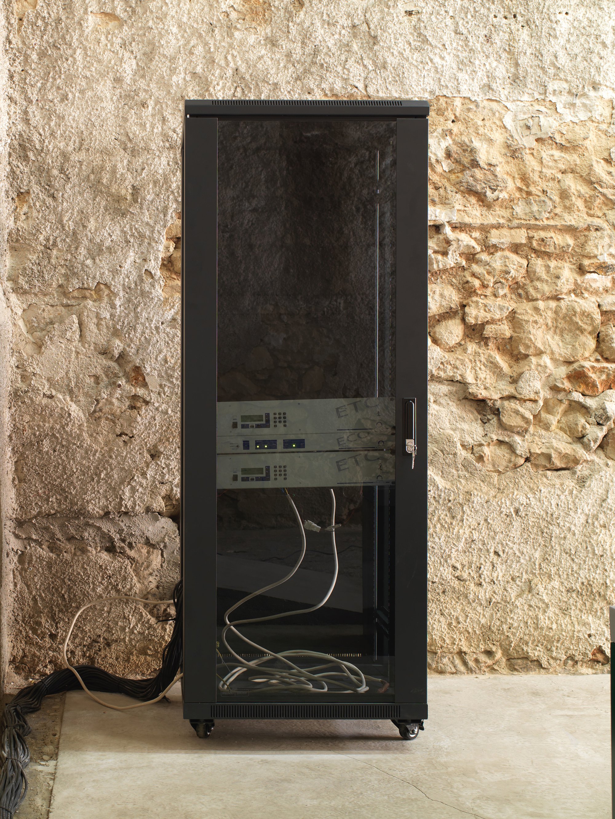 Iris Touliatou, mother frame, empty server cabinet, cables, 60 x 60 x 160 cm &amp; 665 meters approx. (23 5/8 x 23 5/8 x 63 in &amp; 261 3/4 in approx.), 2022