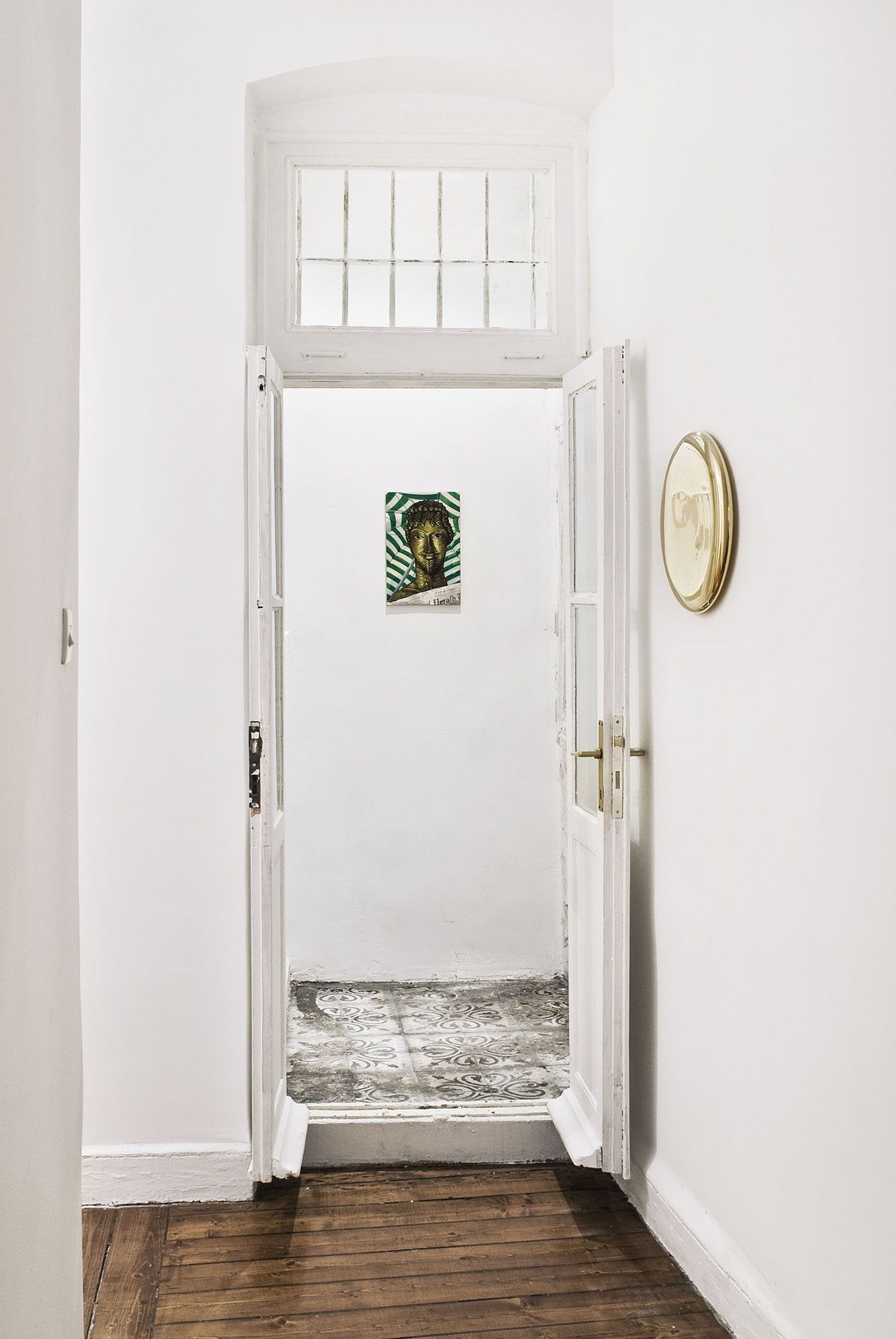 (Centre) Lukas Duwenhögger, Herald, oil on cotton drill, 45 x 29 cm (17 3/4 x 11 3/8 in), 1997, 2012(Right) Michael Anastassiades, Mirror, polished metal, 39 cm dia. (15 3/8 in. dia.)