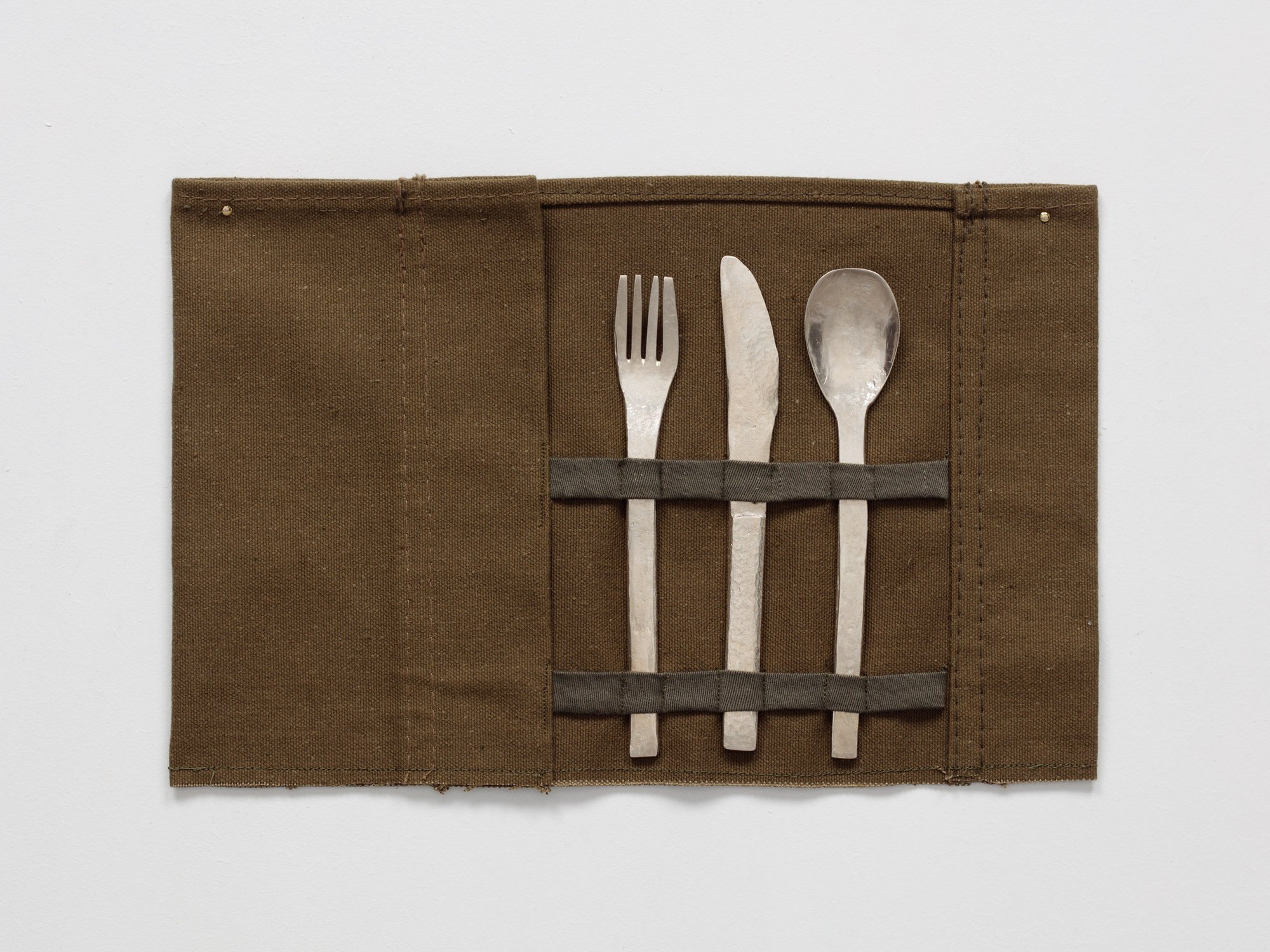 Sidsel Meineche Hansen, home vs owner, cutlery cast in silver, fabric support made by Louis Backhouse, 25 x 43 cm (9 7/8 x 16 7/8 in), 2020